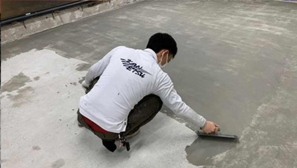 Concrete floor preparation before polyaspartic installation